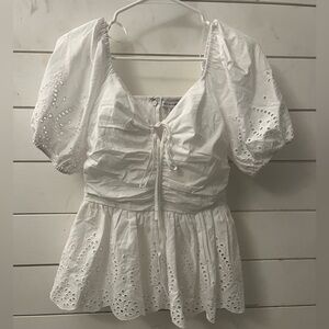 white shirt, brand new, and never been worn